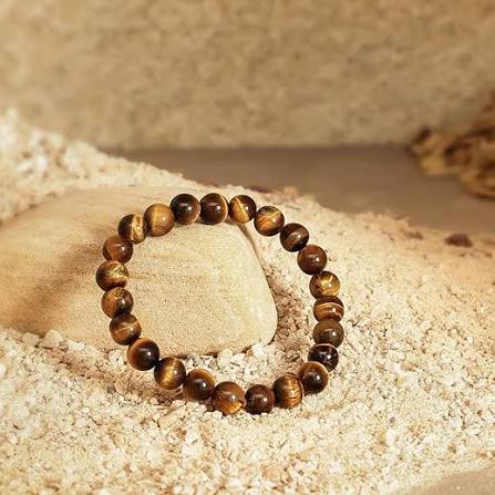 Read more about the article Tiger Eye Bracelet – The Golden Brown Gemstone of Courage, Confidence & Success
